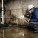 Basement wall with water leaks, cracks, and waterproofing inspection