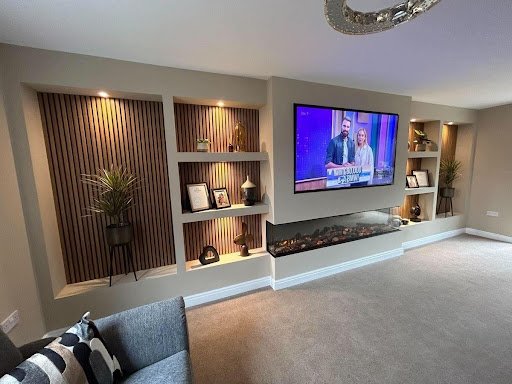 modern media wall unit with built-in shelves and wall mounted TV