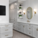 Timeless luxury bathroom with white vanity cabinets and gold mirrors