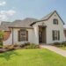 Beautiful modern home with landscaped lawn and well-maintained outdoor space