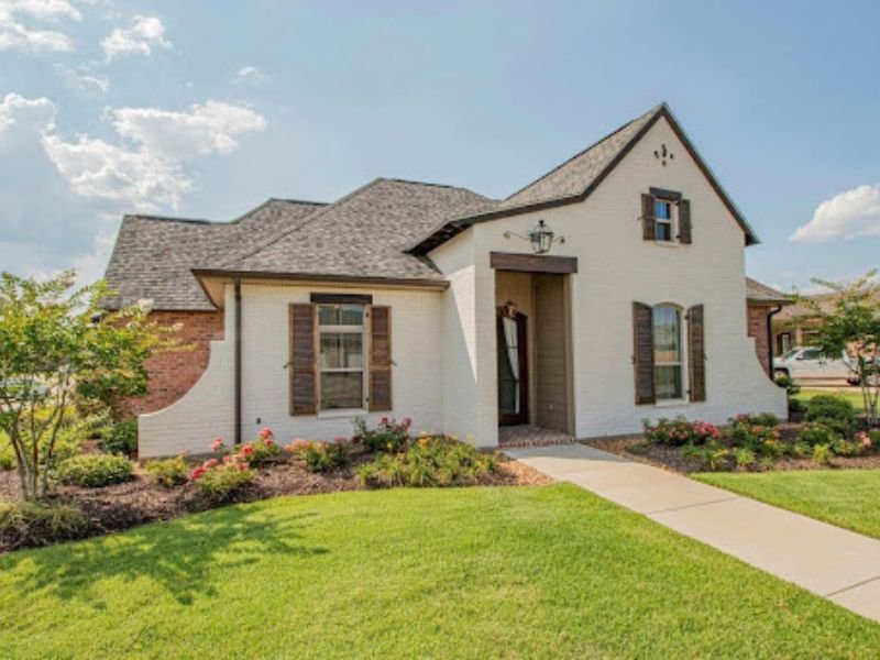 Beautiful modern home with landscaped lawn and well-maintained outdoor space