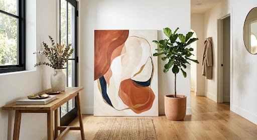 oversized-wall-print-entryway-living-room Oversized prints work well in entryways and living rooms, where a single bold piece is more impactful than a collection of smaller frames