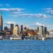 New Jersey waterfront skyline with modern high-rise buildings, waterfront development, and scenic views illustrating the state's appeal for remote workers seeking urban access and lifestyle balance.