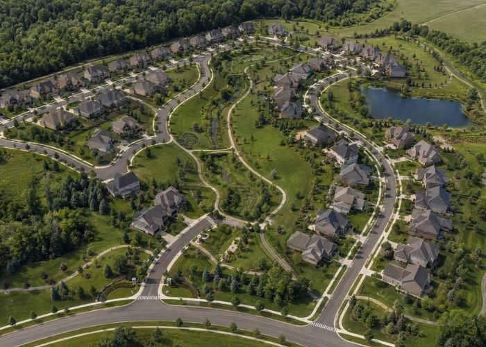 Residential subdivision layout showing roads lots and green spaces
