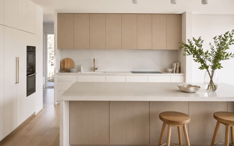 Minimalist kitchen with seamless cabinetry and clutter-free design