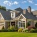 Beautiful modern home with a well-maintained roof during summer