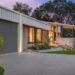 Modern concrete driveway outside a contemporary home showcasing quality driveway construction
