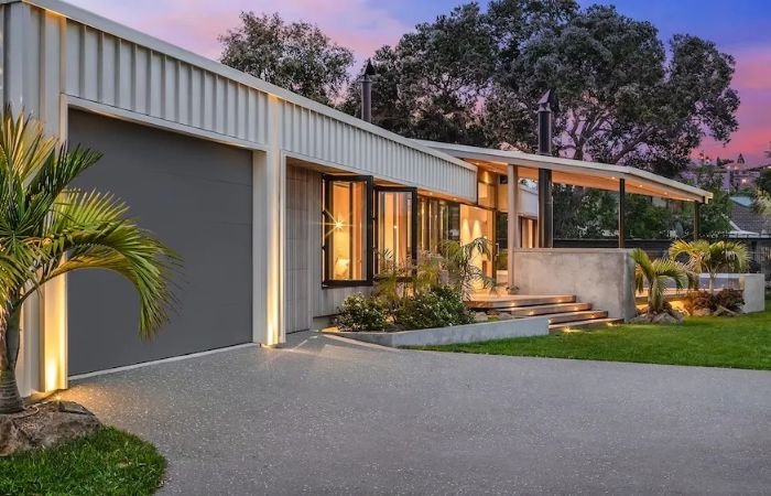 Modern concrete driveway outside a contemporary home showcasing quality driveway construction