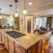 Spacious modern kitchen featuring granite island, quality cabinetry, and durable fixtures for reliable everyday plumbing
