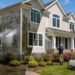 Professional soft washing cleaning vinyl siding compared with high-pressure washing damage