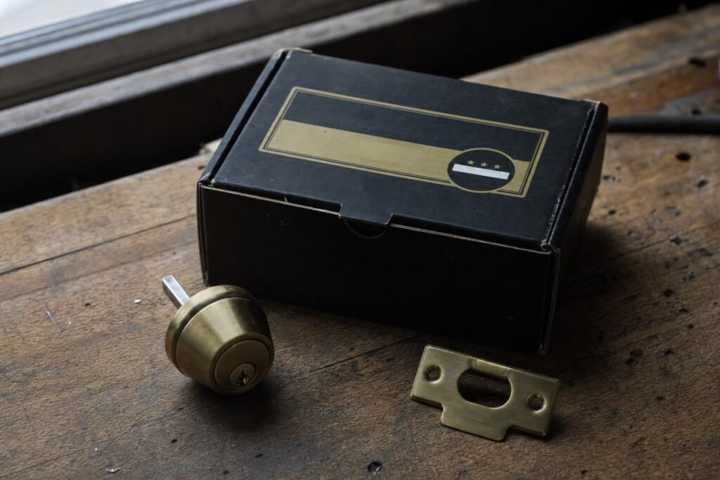 Residential deadbolt and door hardware components for security and durability