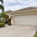Closed garage door on a Naples, Florida home prepared for hurricane season