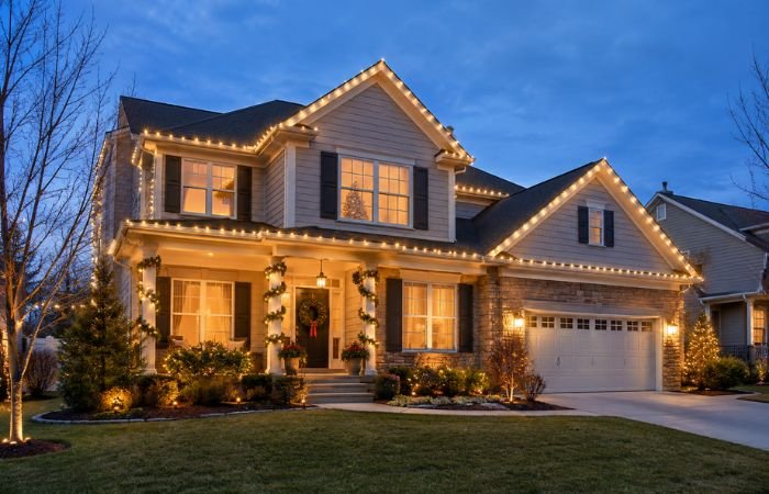 Home with professionally installed holiday lights and elegant seasonal decorations